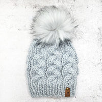 Cable beanie in Thaw with Grey Wolf faux fur pom