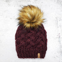 Cable beanie in Claret with Caramel faux fur pom