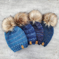 Classic Beanies in Pacific, River Run, Nightshade and Harvest Moon with Timberwolf brown faux fur pom poms.