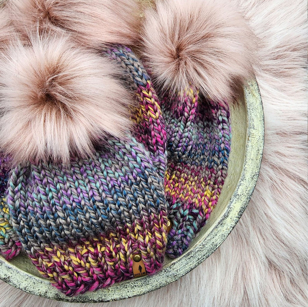 Classic beanies in Astroland with Rose faux fur poms
